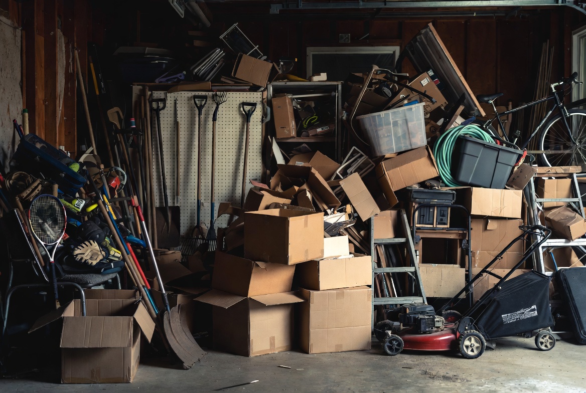 Garage cleanout in Calgary — JunkMojo clearing out boxes, tools and junk from a garage
